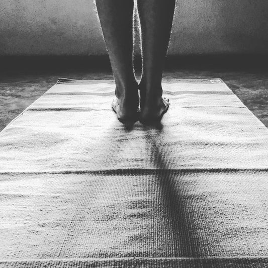 Best towels for yoga mats are not actually towels! Healthy alternative is hand weaved yoga rug.