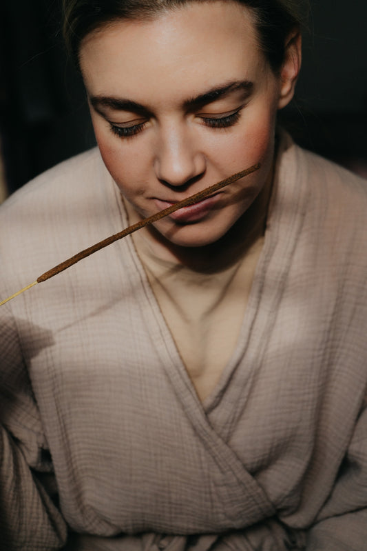 What are the benefits of burning natural incense sticks during Yoga practice?